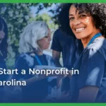 A smiling woman with curly hair wearing a blue lanyard is surrounded by diverse volunteers outdoors. Text overlay reads, “How to start a nonprofit in South Carolina.”