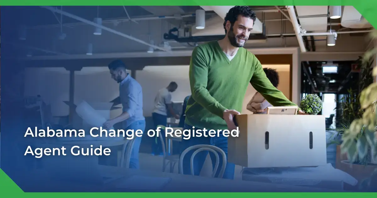 Man in a green sweater smiling and carrying a box in an office setting. Others are packing or working. Text reads Alabama change of registered agent for a nonprofit.