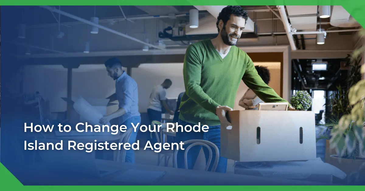 Man in a green sweater smiling and carrying a box in an office setting. Others are packing or working. Text reads Rhode Island change of registered agent for a nonprofit.
